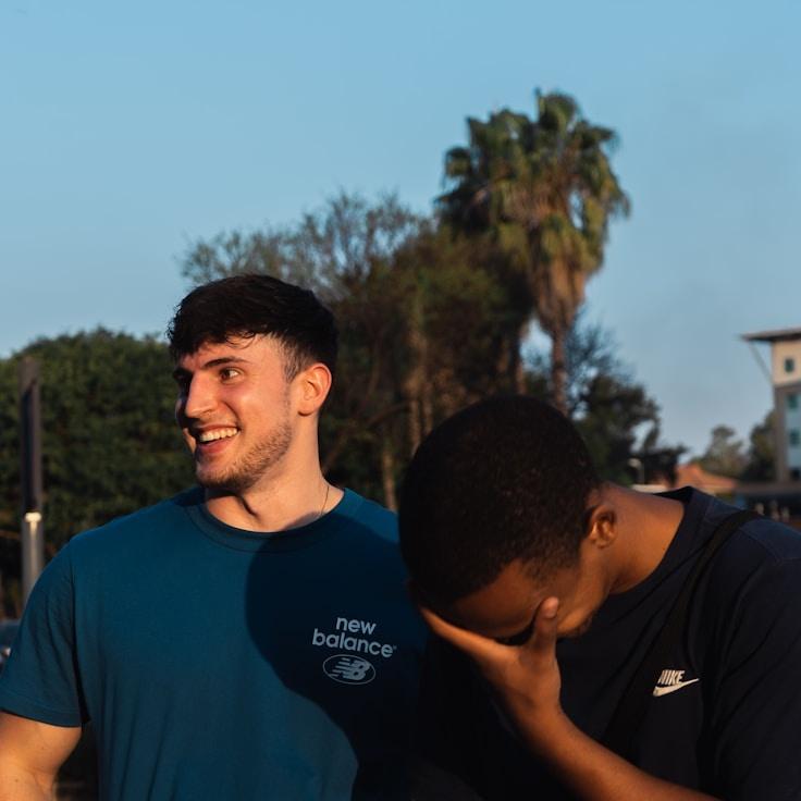 Avery Chen, Lead Design Curator at WhisperingMountainPath, reviewing corporate floral arrangements